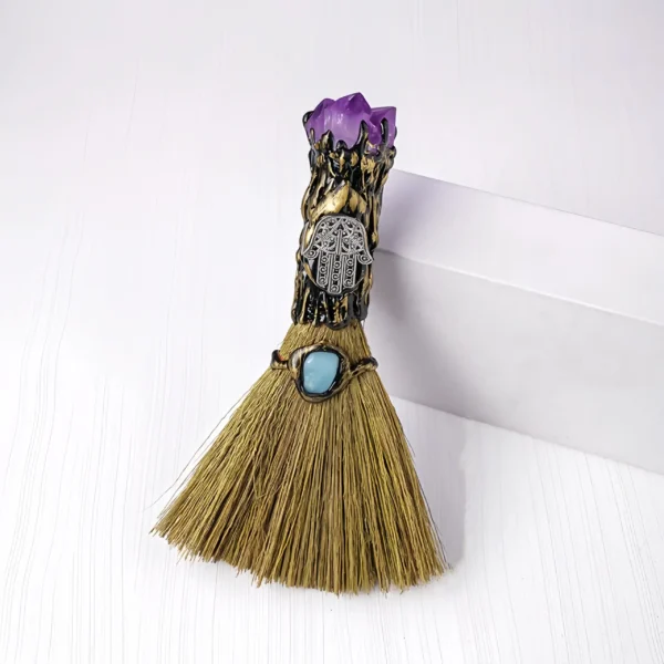 The Amethyst Magic Broom clears negative energy from your home and workspace. Amethyst absorbs low-frequency energies, transforming them into positive vibrations, promoting peace and mental clarity. It eliminates emotional clutter and stress, creating a peaceful atmosphere and productive environment. Ideal for purifying conference rooms, workstations, and meditation spaces, the broom brings soothing relief and healing. It enhances spiritual awareness and intuition, deepening meditation practices. The Amethyst Magic Broom encourages emotional healing, mental balance, and spiritual growth. To use, gently wave it around the space you wish to purify, ensuring that every corner is surrounded by its energy.
