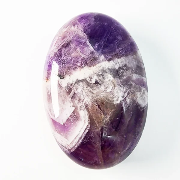 Let calm awareness and intuitive clarity surround you as you hold the Amethyst Palm Stone. Serene, protective, and deeply centering, it supports emotional balance while guiding spiritual insight.