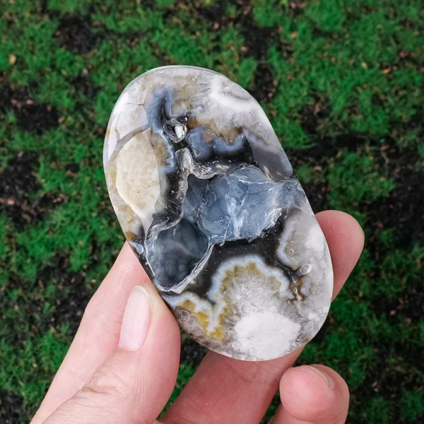 Let stillness settle into your body as you hold the Argentine Agate Geode Palm Stone. Earthy, grounding, and quietly protective, it steadies scattered energy while opening space for inner awareness.