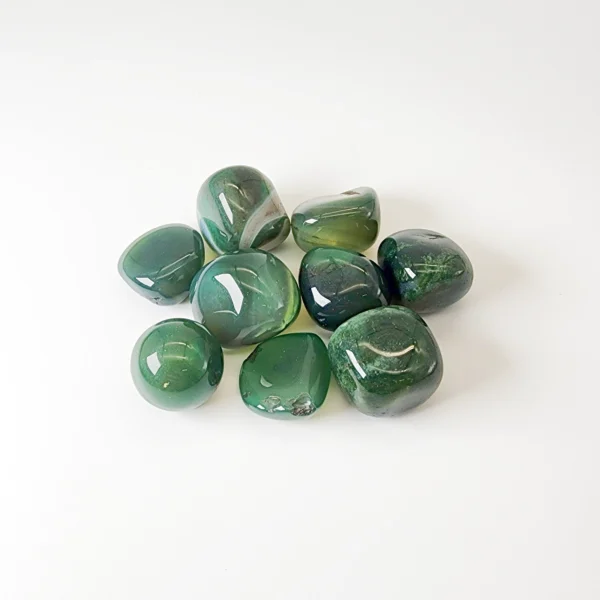 Restore calm and gentle vitality with the Green Agate Tumbled Stone. Smooth and reassuring, it soothes restless energy while supporting physical balance and emotional ease. Ideal for moments of tension, overthinking, or disrupted rest.