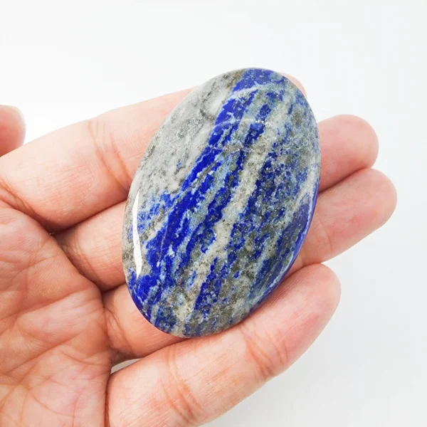 Let truth rise and confidence settle into your voice as you hold the Lapis Lazuli Palm Stone. Deep blue and quietly empowering, it supports clear communication while strengthening inner resolve.