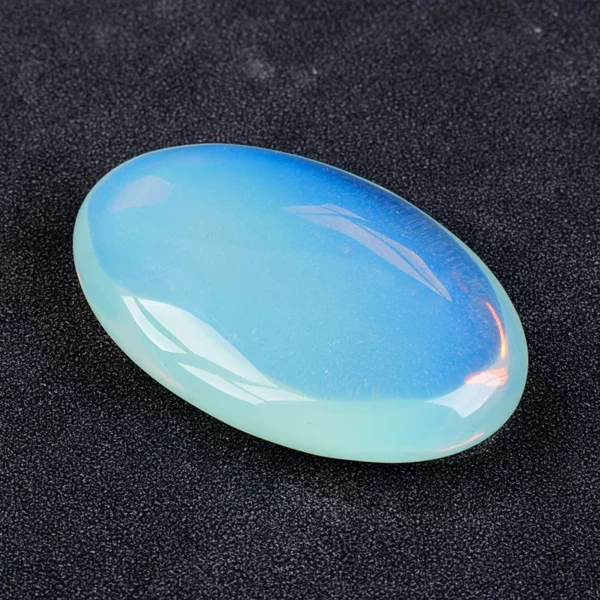 Let inspiration soften into calm as you hold the Opal Palm Stone. Gentle, luminous, and emotionally soothing, it nurtures creativity while restoring inner peace.