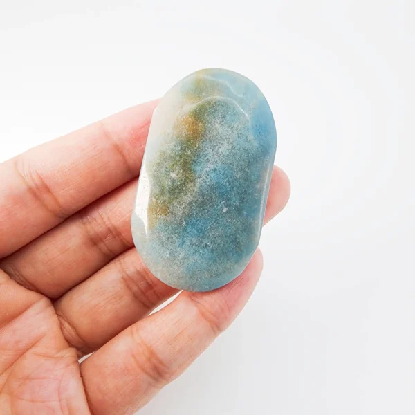 Let awareness deepen and emotions settle as you hold the Trolleite Palm Stone. Softly luminous and inwardly calming, it supports intuitive clarity while easing emotional weight.
