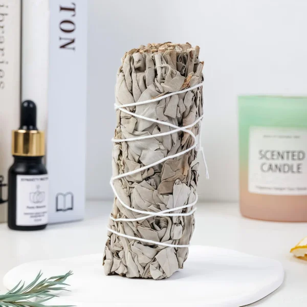 White Sage has been used for centuries in purification rituals and spiritual practices. Its aroma helps clear negative energy and raise vibrational frequencies. Lighting a White Sage Stick for meditation allows the smoke to clear the mind and create a focused state. For crystal cleansing, it removes negative energies from the surface of crystals, restoring their pure energy field. To use, light the stick, wave it around the item or space needing purification, and inhale its aroma during meditation. For crystals, place them in the smoke and gently wave the stick over them.
