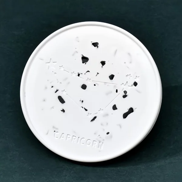 The Capricorn Zodiac Crystal Plaster Plate enhances determination, stability, and protection. Obsidian, Capricorn's representative crystal, offers strong protective energy, promoting emotional stability and mental resilience. This grounding stone clears negative emotions and energy, helping Capricorns stay calm and focused. Made from natural gypsum, the plate cleanses and charges crystals, boosting confidence and perseverance. Ideal for placement in a workspace, study area, or meditation space, it enhances focus and decision-making ability.