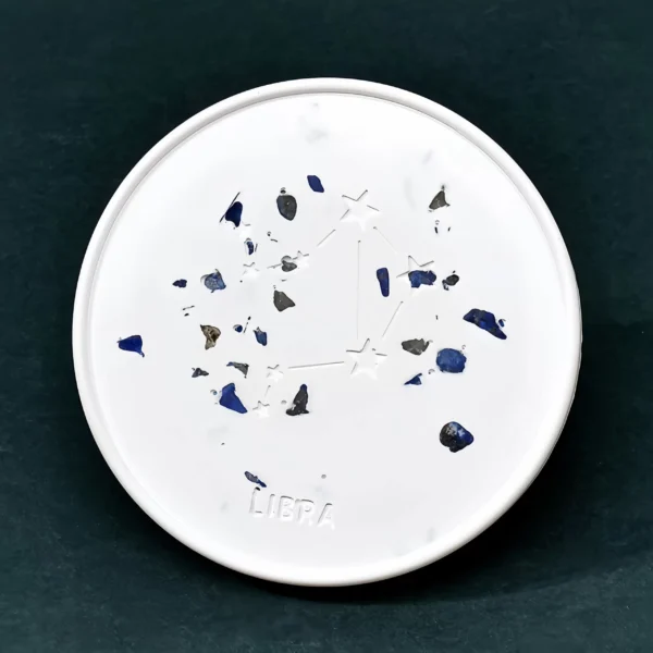 The Libra Zodiac Crystal Plaster Plate enhances communication, balance, and harmony. Lapis Lazuli, Libra's representative crystal, promotes inner balance, rational thinking, and wisdom, aiding in complex interpersonal situations. It enhances communication skills, social abilities, and intuition, fostering harmonious relationships. Made from natural gypsum, the plate serves as a cleansing and charging tool for crystals, clearing negative energy and activating positive energy. Ideal for Libra's living room, office, or social space, it enhances the atmosphere and boosts communication abilities.