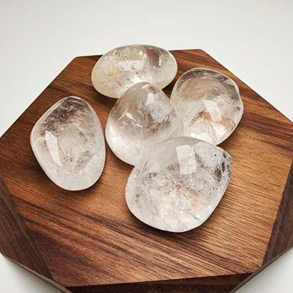 Carry clarity and amplified energy with the Clear Quartz Tumbled Stone. Smooth and luminous, it enhances intuition, strengthens protection, and harmonizes your entire energy field.