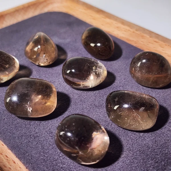 Restore strength and grounding with the Smoky Quartz Tumbled Stone. Deeply stabilizing and gently supportive, it anchors scattered energy while encouraging physical recovery and renewed vitality.