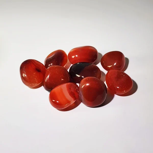 Restore calm strength and physical balance with the Red Agate Tumbled Stone. Warm, steady, and deeply soothing, it supports vitality while easing tension within the body and mind.