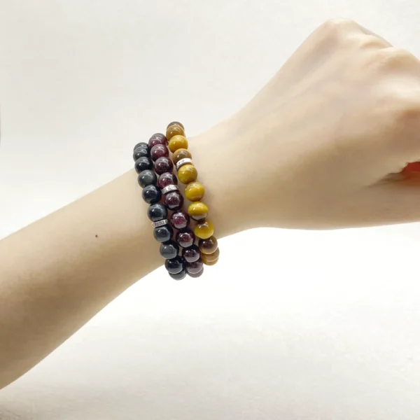 Capricorn is disciplined, reliable, and determined, yet sometimes struggles with self-doubt. This Capricorn Zodiac Jewelry set features Tiger’s Eye, Garnet, and Silver Sheen Obsidian, chosen to provide grounding, protection, and emotional balance. Perfect for daily wear or meditation, the bracelets support resilience and steady progress.