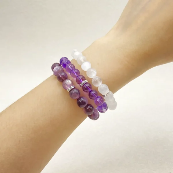 The Crown Chakra Crystals Bracelet Set includes Selenite, Amethyst, and Lepidolite—each chosen to enhance intuition, clarity, and inner peace. Perfect for meditation, spiritual practice, or conscious living, this set restores balance in the crown chakra’s energy and helps you connect deeply with higher consciousness and divine guidance.