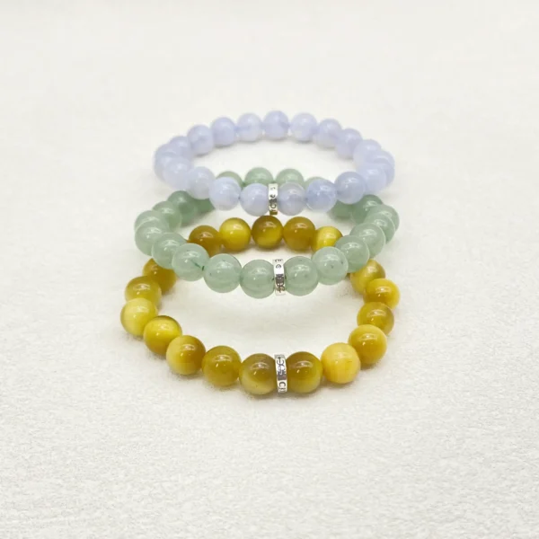 Gemini Crystals bring calm, balance, and focus with Blue Lace Agate, Green Aventurine & Tiger’s Eye. Shine with clarity wearing a handmade Gemini Crystals Bracelet.