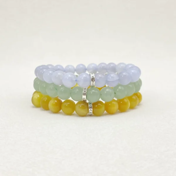 Gemini Crystals bring calm, balance, and focus with Blue Lace Agate, Green Aventurine & Tiger’s Eye. Shine with clarity wearing a handmade Gemini Crystals Bracelet.