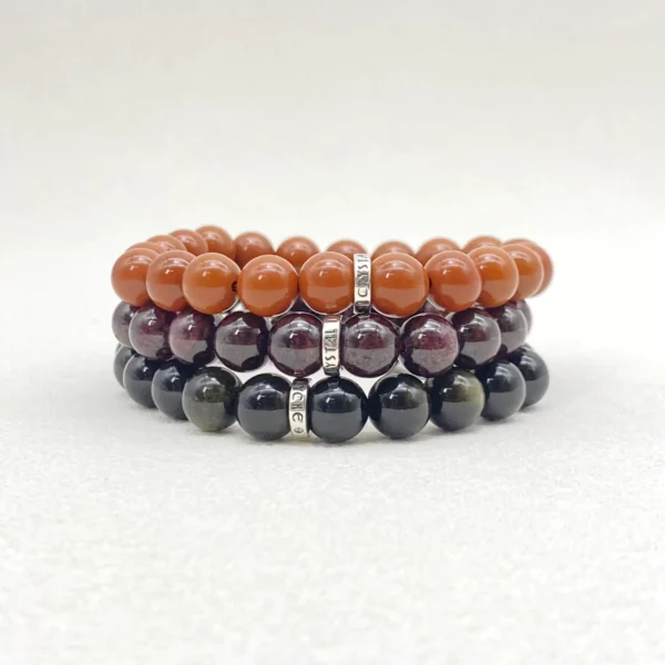 The Root Chakra Crystals Bracelet Set features Red Jasper, Garnet, and Gold Obsidian, each chosen for grounding, courage, and protection. Ideal for those seeking inner strength and resilience, this set restores balance in the root chakra’s energy and helps you stay secure, focused, and confident in daily life.