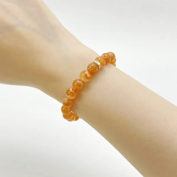 The Sunstone Bracelet embodies warmth, vitality, and motivation. Known as a crystal of leadership and courage, it helps you boost confidence, overcome hesitation, and embrace your ambitions. Made from Authentic AAA Grade gemstones, this piece radiates a golden sparkle like sunlight on your skin, uplifting your mood and energy.
