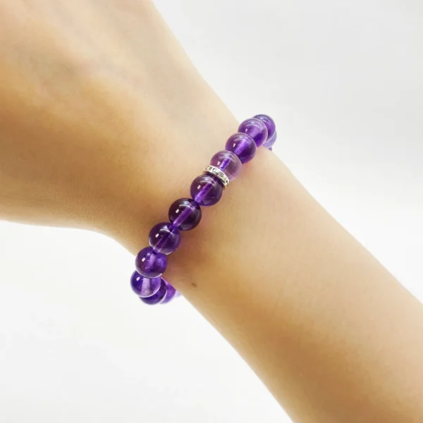 Handcrafted from rare Uruguay Amethyst, the Amethyst Bracelet supports deep healing and recovery. Its tranquil violet energy restores balance, clears emotional fatigue, and nurtures spiritual renewal. A perfect crystal companion for calming stress, improving focus, and harmonizing your energy field in both daily life and moments of reflection.