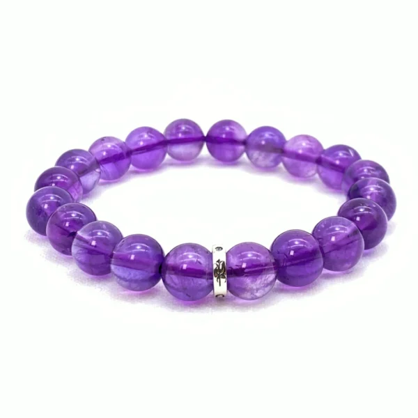 Handcrafted from rare Uruguay Amethyst, the Amethyst Bracelet supports deep healing and recovery. Its tranquil violet energy restores balance, clears emotional fatigue, and nurtures spiritual renewal. A perfect crystal companion for calming stress, improving focus, and harmonizing your energy field in both daily life and moments of reflection.