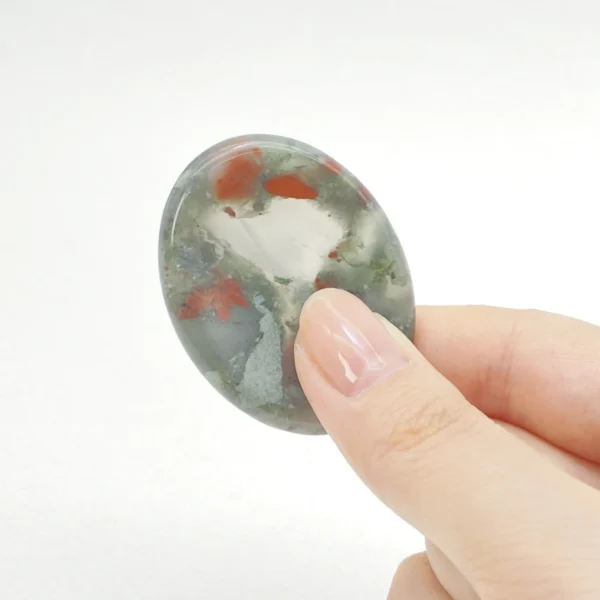 Bloodstone Worry Stone grounds your energy, boosts courage, and restores emotional balance. Hold calm strength in your hands—bring this powerful stone home today.