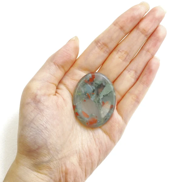 Bloodstone Worry Stone grounds your energy, boosts courage, and restores emotional balance. Hold calm strength in your hands—bring this powerful stone home today.