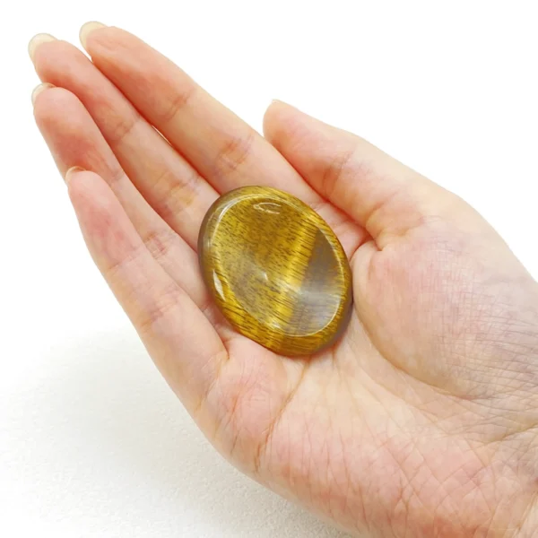 Tiger’s Eye Worry Stone boosts clarity, confidence, and emotional balance. Hold radiant courage in your hands—bring home this empowering stone today.
