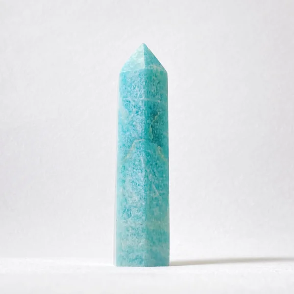 The Amazonite Point is a stone of gentle truth and courageous transformation. Known for its calming blue-green tones, it supports heartfelt communication, emotional healing, and graceful change. Its pointed form helps direct soothing yet empowering energy, guiding you to express your truth clearly while embracing new beginnings with confidence and inner peace.