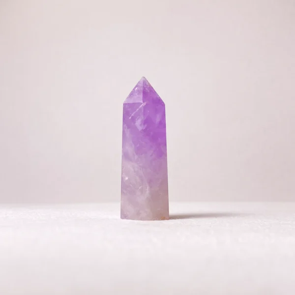 The Amethyst Mini Point is a powerful ally for emotional balance, mental clarity, and spiritual awakening. Its focused shape directs calming energy upward, helping to ease stress, harmonize inner energies, and gently open intuitive awareness. Ideal for meditation spaces, work desks, or moments of reflection.