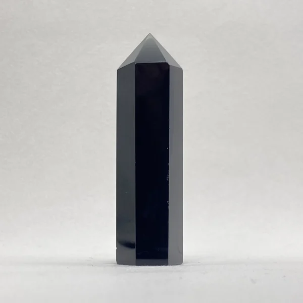 The Black Obsidian Point is a powerful grounding crystal that shields against negativity while supporting deep inner transformation. Its sharp, focused form helps cut through energetic blockages, offering clarity, protection, and strength during times of profound change and emotional intensity.
