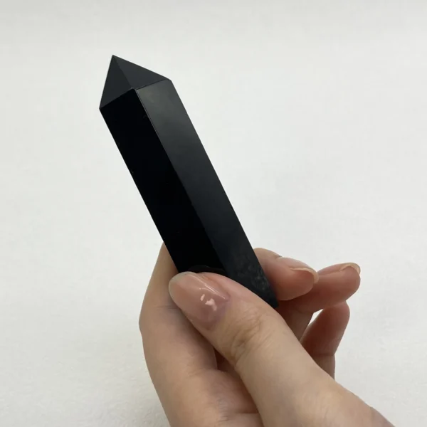 The Black Obsidian Point is a powerful grounding crystal that shields against negativity while supporting deep inner transformation. Its sharp, focused form helps cut through energetic blockages, offering clarity, protection, and strength during times of profound change and emotional intensity.