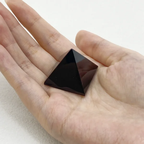 The Black Obsidian Pyramid offers deep grounding and energetic protection, creating a steady foundation during times of change. Its bold presence absorbs disruptive energy while encouraging inner strength and clarity. Ideal for grounding rituals, personal spaces, or moments of transition, it helps you release what no longer serves and stand firmly in your truth.