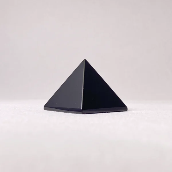 The Black Obsidian Pyramid offers deep grounding and energetic protection, creating a steady foundation during times of change. Its bold presence absorbs disruptive energy while encouraging inner strength and clarity. Ideal for grounding rituals, personal spaces, or moments of transition, it helps you release what no longer serves and stand firmly in your truth.