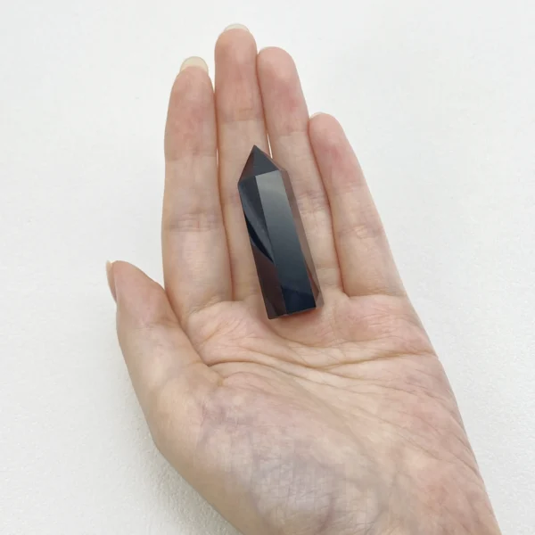 The Black Obsidian Mini Point is a powerful grounding crystal that shields against negativity while supporting deep inner transformation. Its sharp, focused form helps cut through energetic blockages, offering clarity, protection, and strength during times of profound change and emotional intensity.