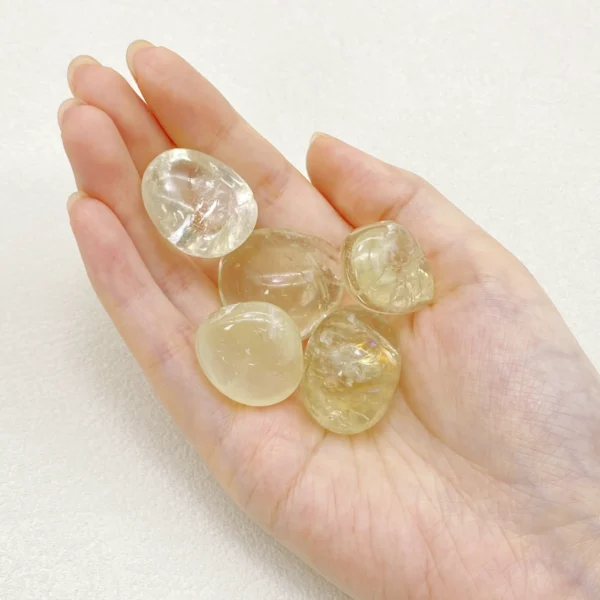 Invite light and momentum into your life with the Citrine Tumbled Stone, a radiant companion that nurtures confidence, ambition, and abundance. Its warm energy encourages optimism and purposeful action.