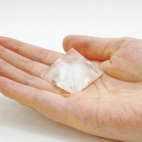 The Clear Quartz Pyramid channels focused clarity and grounding protection through sacred geometry. Its luminous structure amplifies intention, stabilizes energy, and supports spiritual awareness in daily life. Ideal for meditation spaces, work environments, or anywhere balance and protection are desired.
