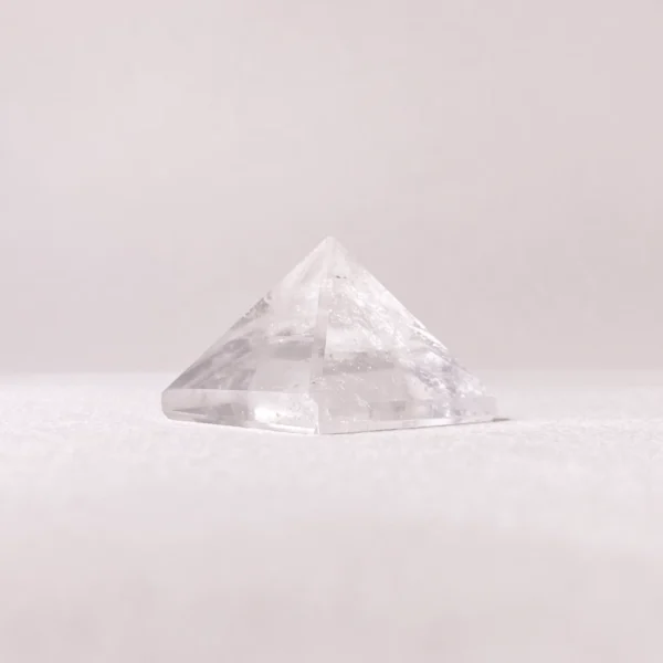 The Clear Quartz Pyramid channels focused clarity and grounding protection through sacred geometry. Its luminous structure amplifies intention, stabilizes energy, and supports spiritual awareness in daily life. Ideal for meditation spaces, work environments, or anywhere balance and protection are desired.