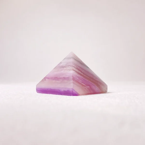 Fluorite Pyramid inspires clarity, creativity, and spiritual insight. Focus your mind and awaken imagination—invite this radiant crystal home today.