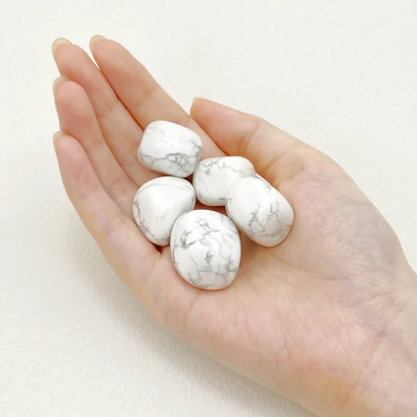 Return to humility and inner calm with the Howlite Tumbled Stone, a gentle companion that quiets mental noise while deepening self-awareness. Its soothing presence supports emotional balance and spiritual clarity.