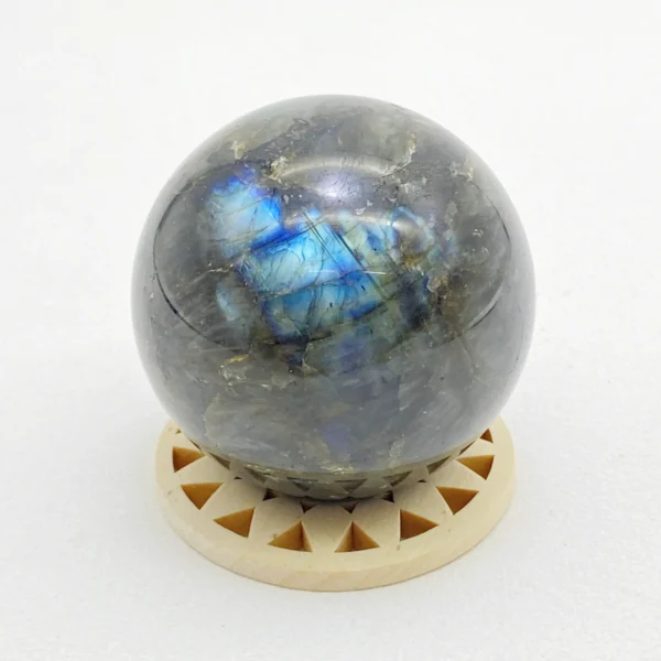 The Labradorite Sphere awakens transformation, inner strength, and intuitive awareness. Its luminous energy supports change while guiding you through uncertainty with clarity and courage. Resting on its round base, it brings depth, mystery, and renewal into any space.