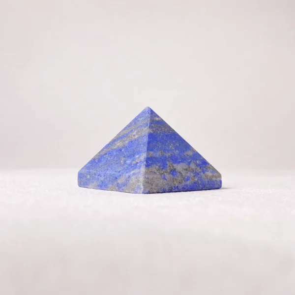 The Lapis Lazuli Pyramid supports focused thought, confident expression, and purposeful decision-making. Known for awakening inner wisdom, it encourages clear communication and mental discipline, making it ideal for moments of study, solitude, or life-defining choices.