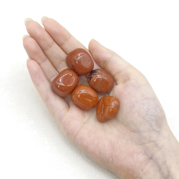 Restore steady strength with the Red Jasper Tumbled Stone, a grounding companion that supports physical vitality and endurance. Its earthy presence nurtures resilience when energy feels depleted.