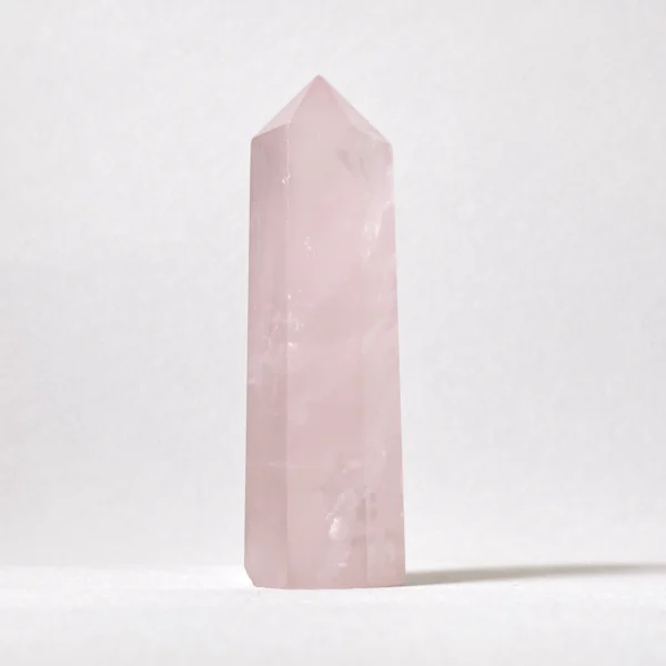 The Rose Quartz Point embodies gentle love and emotional healing, offering comfort during moments of vulnerability and renewal. Its soft, nurturing energy supports self-love, compassion, and harmonious relationships, while the pointed form helps direct loving intentions with clarity. Ideal for heart-centered healing, reconciliation, and cultivating inner peace during emotional transitions.