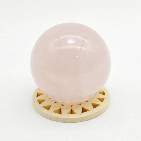 The Rose Quartz Sphere radiates gentle love, emotional comfort, and heart-centered harmony. Its soft, nurturing energy supports healing, forgiveness, and deeper connection with yourself and others. Resting on its round base, it brings warmth and compassion into any space.