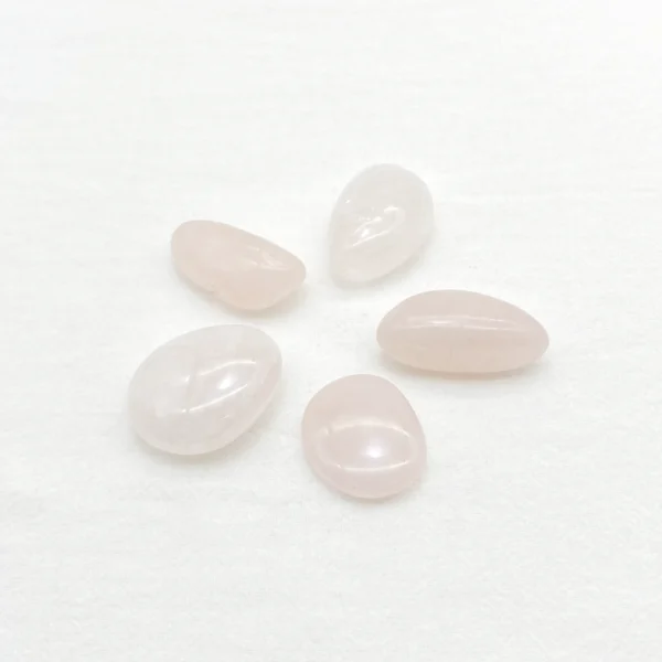 Open your heart gently with the Rose Quartz Tumbled Stone, a soothing companion that nurtures love, emotional healing, and inner peace. Its soft energy encourages compassion toward yourself and others.
