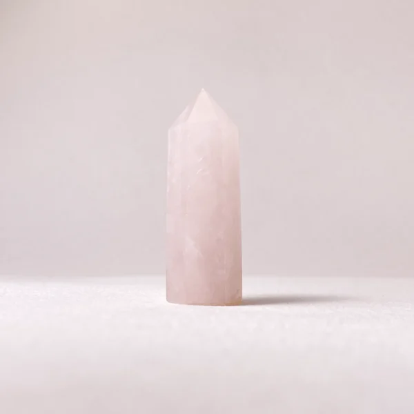 The Rose Quartz Mini Point embodies gentle love and emotional healing, offering comfort during moments of vulnerability and renewal. Its soft, nurturing energy supports self-love, compassion, and harmonious relationships, while the pointed form helps direct loving intentions with clarity. Ideal for heart-centered healing, reconciliation, and cultivating inner peace during emotional transitions.