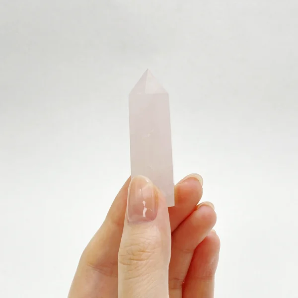 The Rose Quartz Mini Point embodies gentle love and emotional healing, offering comfort during moments of vulnerability and renewal. Its soft, nurturing energy supports self-love, compassion, and harmonious relationships, while the pointed form helps direct loving intentions with clarity. Ideal for heart-centered healing, reconciliation, and cultivating inner peace during emotional transitions.