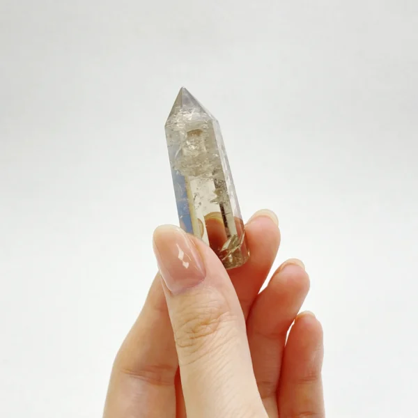 The Smoky Quartz Mini Point is a deeply grounding crystal that supports healing, recovery, and physical vitality. Known for anchoring scattered energy, it strengthens the root chakra while restoring balance during times of exhaustion or instability. Its focused point form gently channels stabilizing energy, making it ideal for recovery, grounding, and rebuilding inner strength.