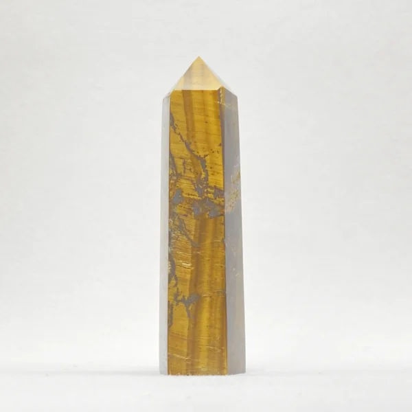 The Tigers Eye Point is a crystal of courage, confidence, and steady motivation. Its golden-brown bands channel grounded strength while encouraging clear self-expression. Ideal for moments requiring bravery, focus, and personal power, it supports you in standing tall within complex social and professional environments.