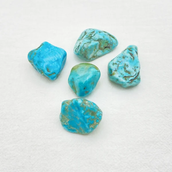 Walk your path with clarity and protection through the Turquoise Tumbled Stone, a sacred companion that supports intuition, emotional balance, and spiritual guidance. Its calming presence steadies energy while opening the voice of the soul.