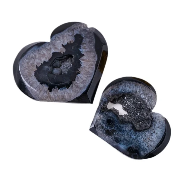 Dark and grounding, this Black Druzy Agate Heart offers steady protection and emotional anchoring. Featuring a sparkling druzy core and deep black agate exterior, it rests on a minimalist metal stand to stabilize your space while shielding against unwanted energy during times of stress or transition.