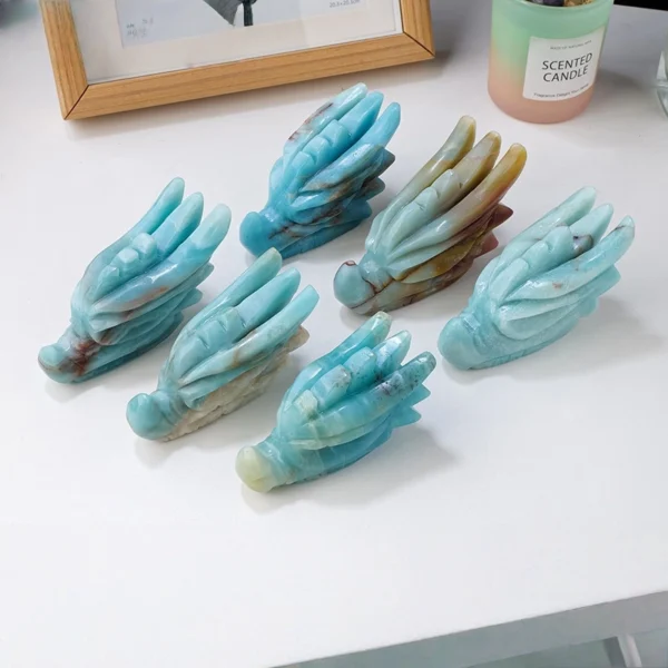Bold and expressive, the Amazonite Dragon Head channels truth, courage, and transformational power. Hand-carved from soothing blue-green amazonite, it supports clear communication and emotional balance while symbolizing inner strength and renewal. This striking piece brings clarity, confidence, and purposeful energy into your space.