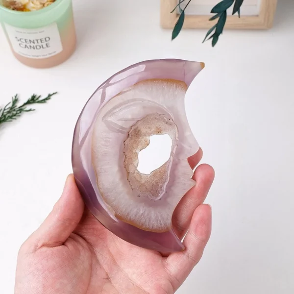 Mystical and serene, this Druzy Agate Moon invites deep intuition and gentle healing into your space. Hand-carved to reveal a tranquil lunar face and shimmering druzy core, it supports spiritual growth while offering calm reassurance during periods of recovery and inner renewal.